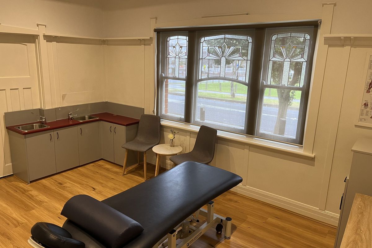 Treatment room at Wellbeing Chiropractic Dandenong with a chiropractic table